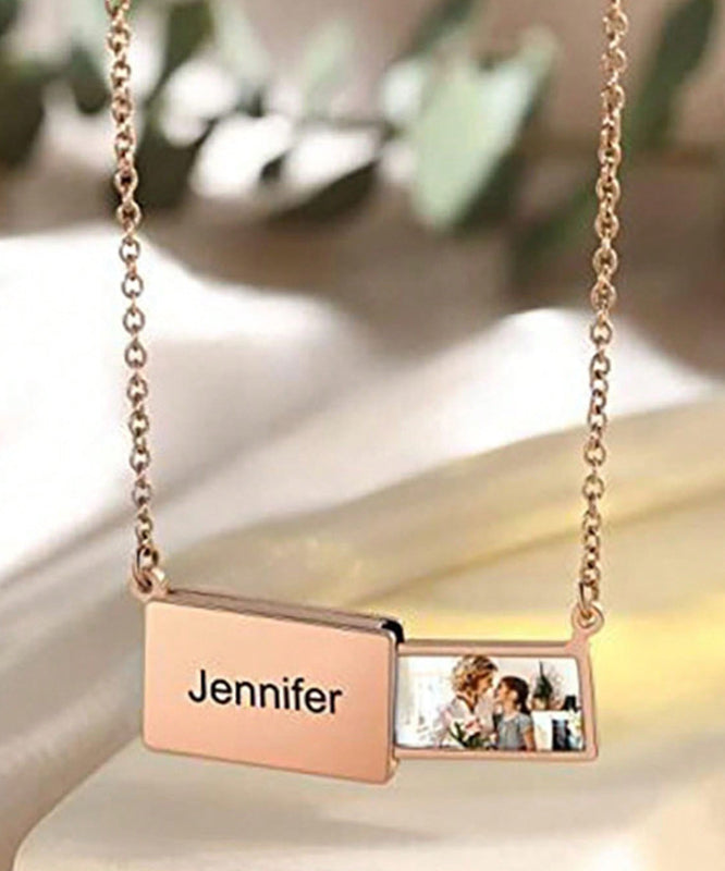 Novelty Gold Stainless Steel Graphic Pulling Type Pendant Necklace