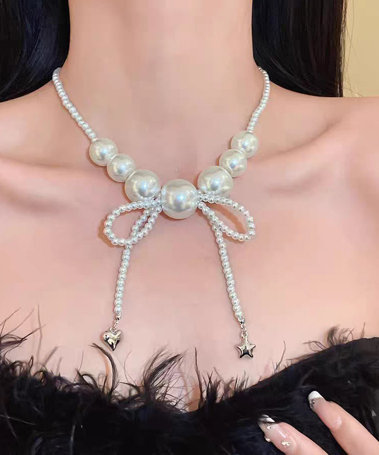 Art White Alloy Pearl Bow Pendant Necklace