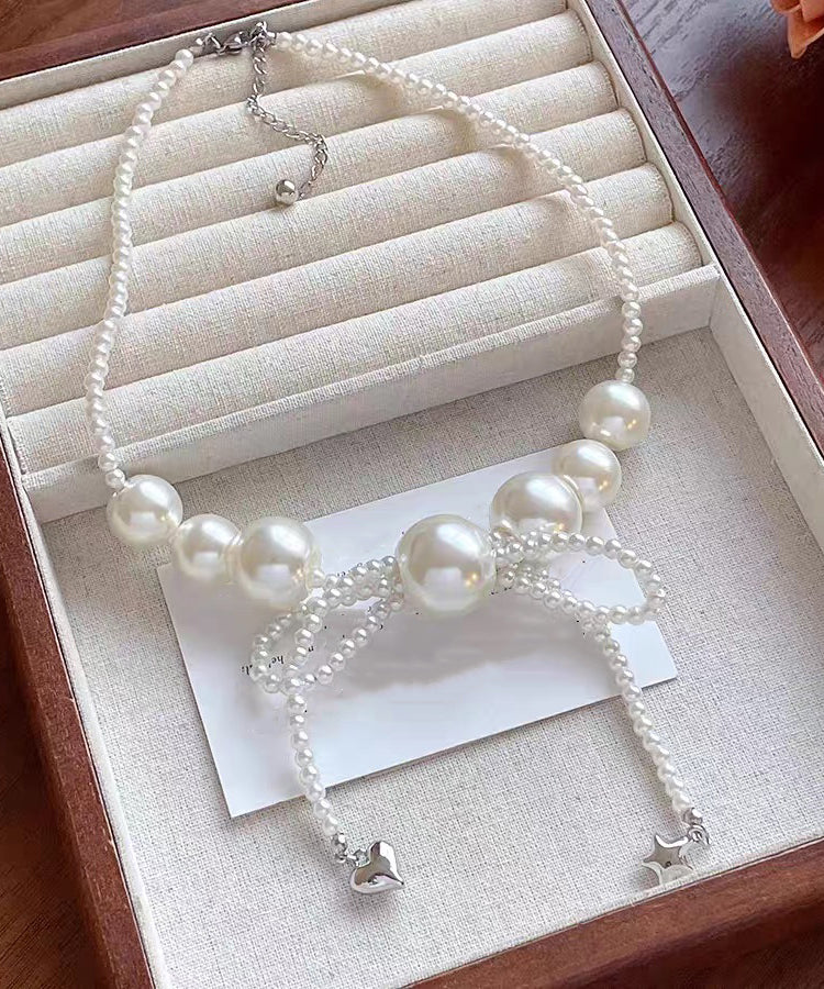 Art White Alloy Pearl Bow Pendant Necklace