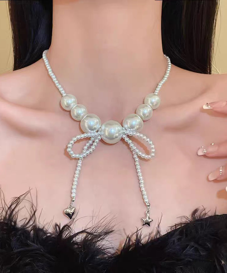 Art White Alloy Pearl Bow Pendant Necklace
