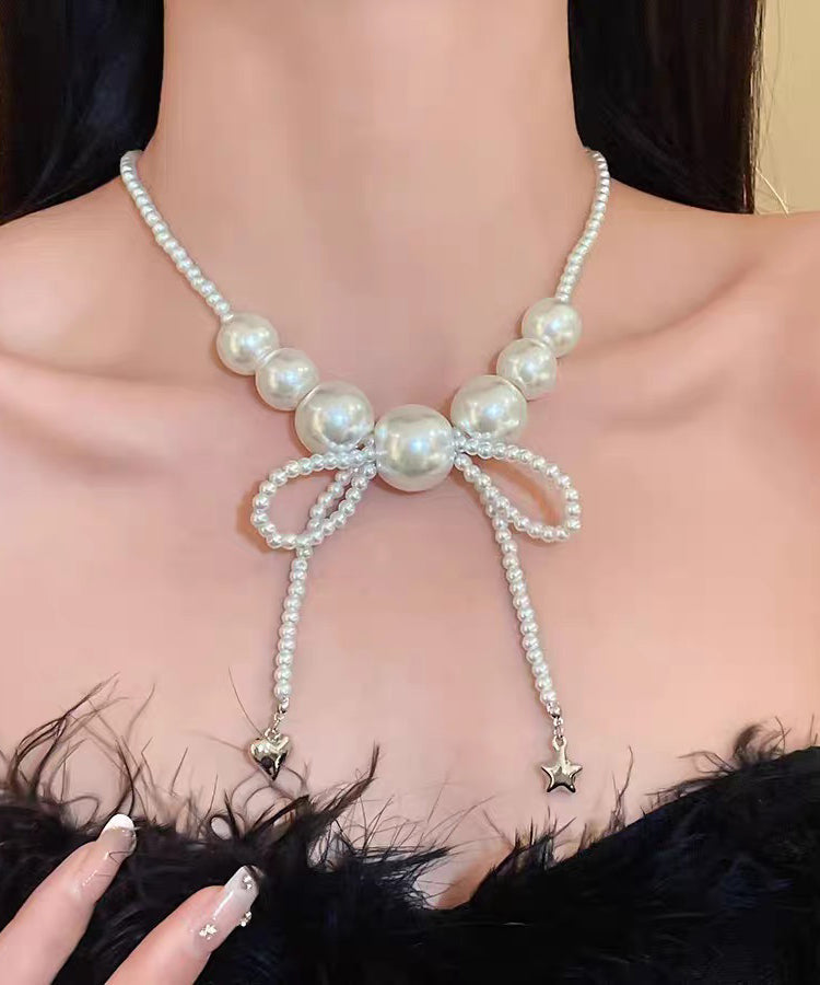 Art White Alloy Pearl Bow Pendant Necklace