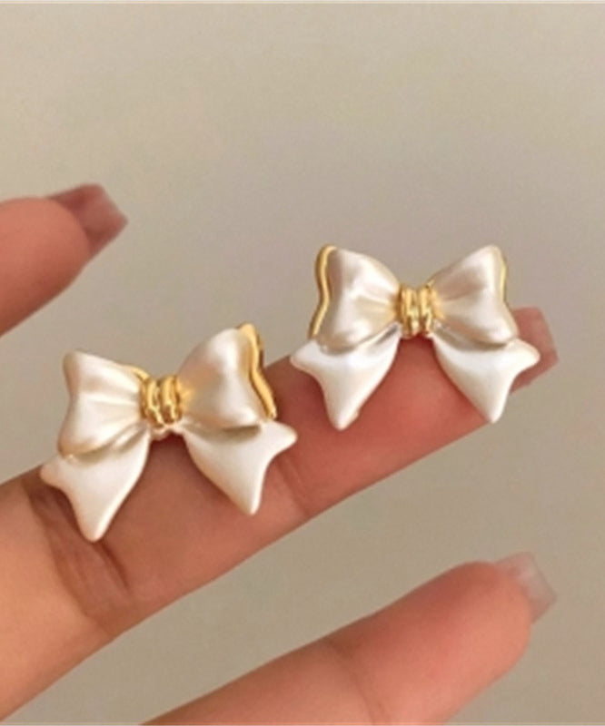 Art White Copper Alloy Bow Stud Earrings