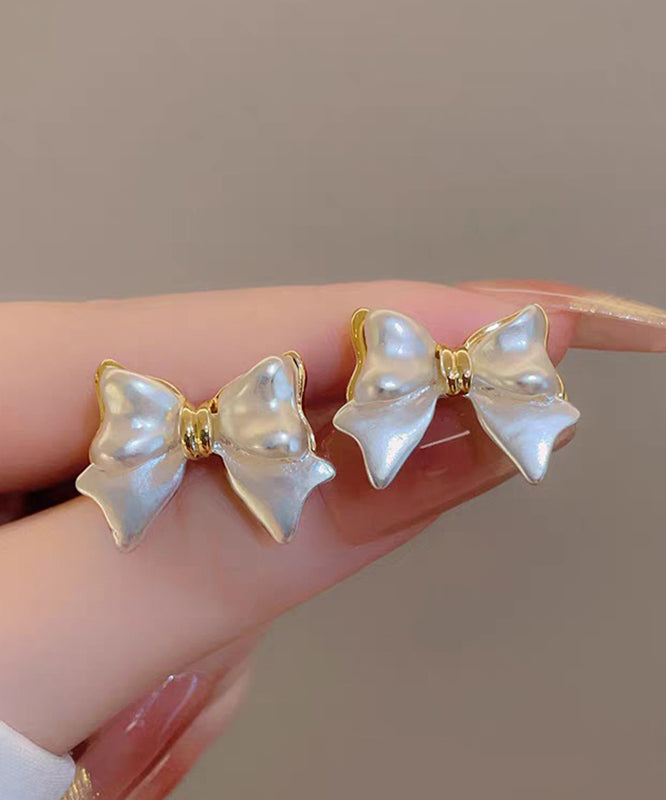 Art White Copper Alloy Bow Stud Earrings