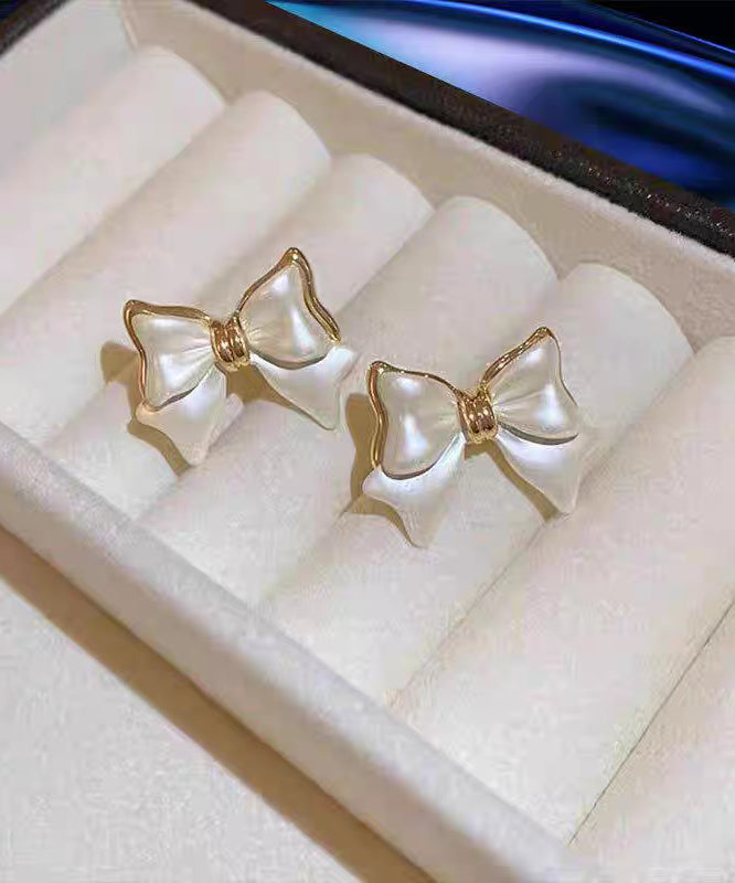 Art White Copper Alloy Bow Stud Earrings