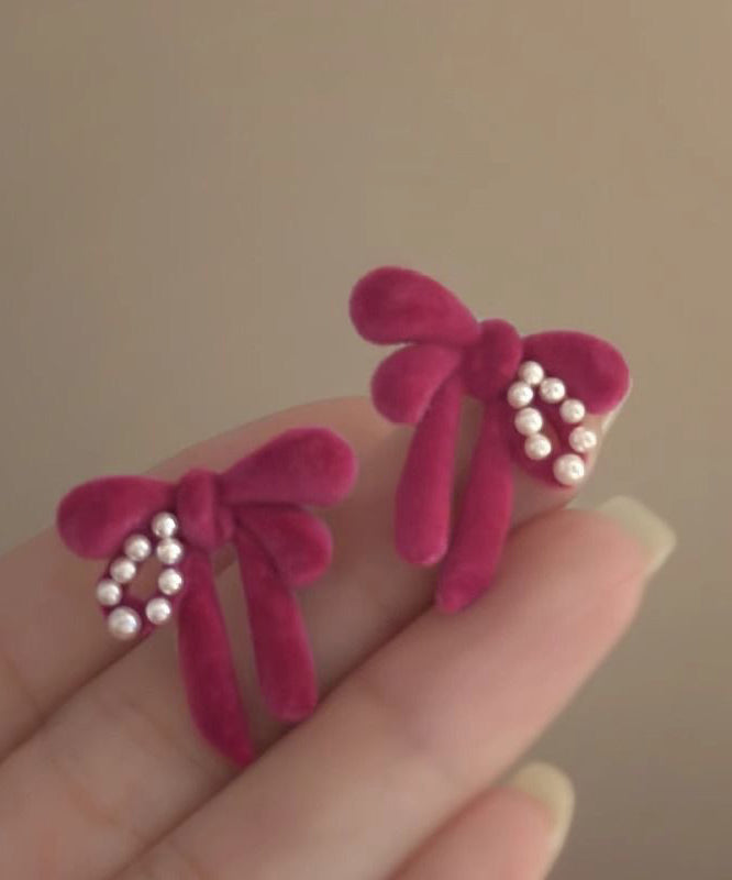 Cute Raspberry Powder Sterling Silver Flocking Pearl Bow Stud Earrings