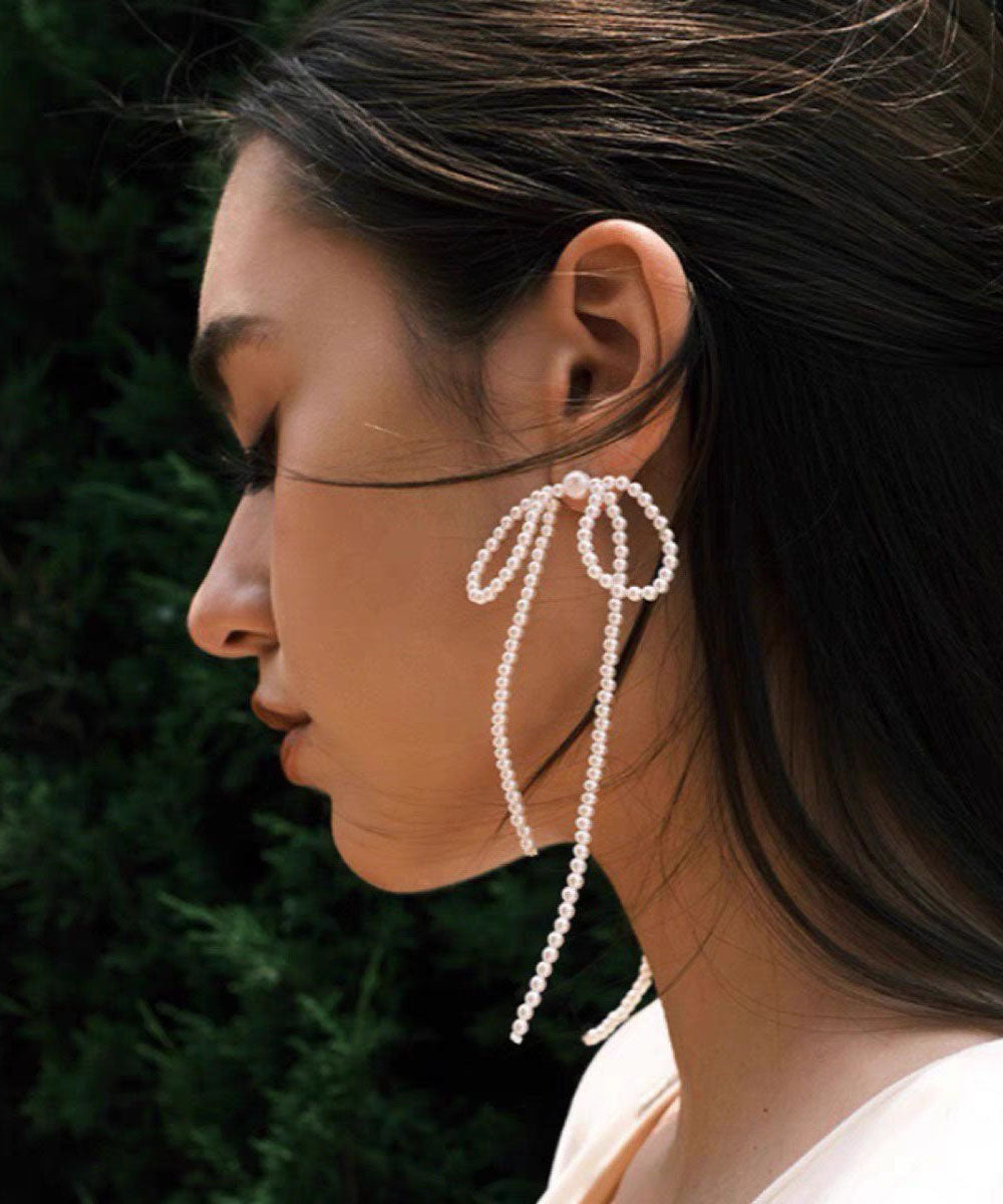 Elegant White Alloy Bow Beading Tassel Drop Earrings
