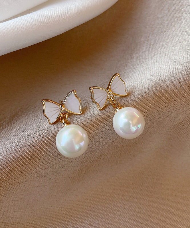Elegant White Copper Alloy Bow Shell Pearl Drop Earrings