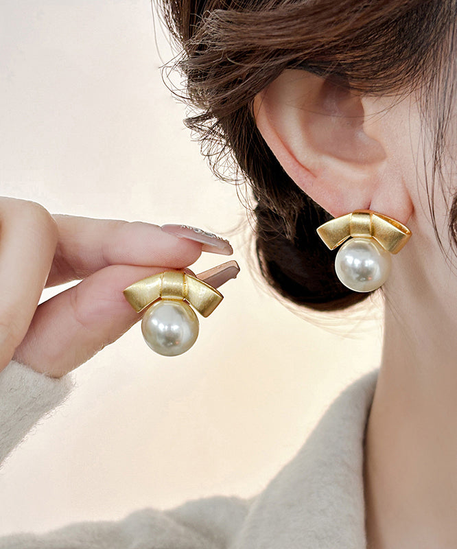 Fashion Gold Alloy Pearl Bow Stud Earrings