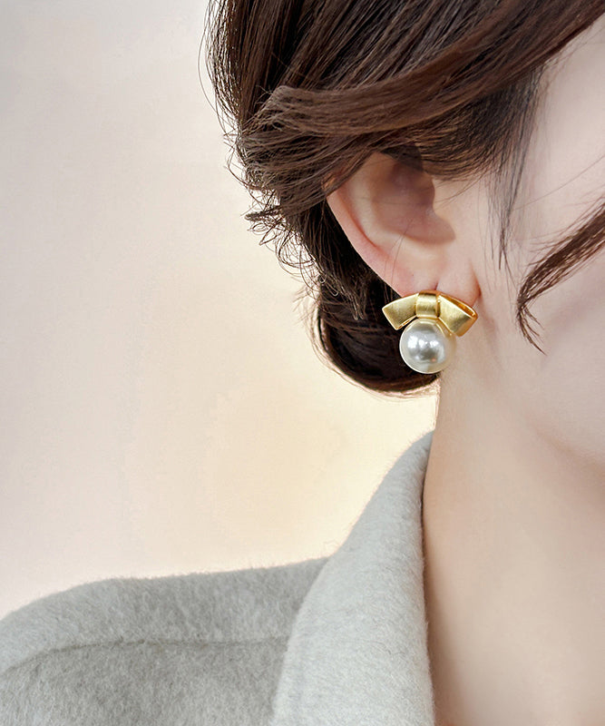 Fashion Gold Alloy Pearl Bow Stud Earrings