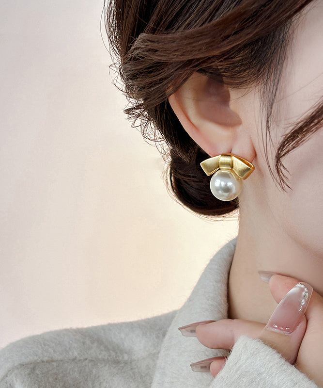 Fashion Gold Alloy Pearl Bow Stud Earrings