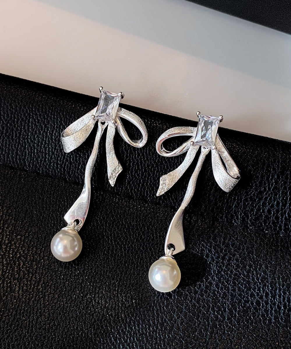 Fashion Silvery Bow Metal Pearl Pendant Fine Zircon Drop Earrings - Omychic