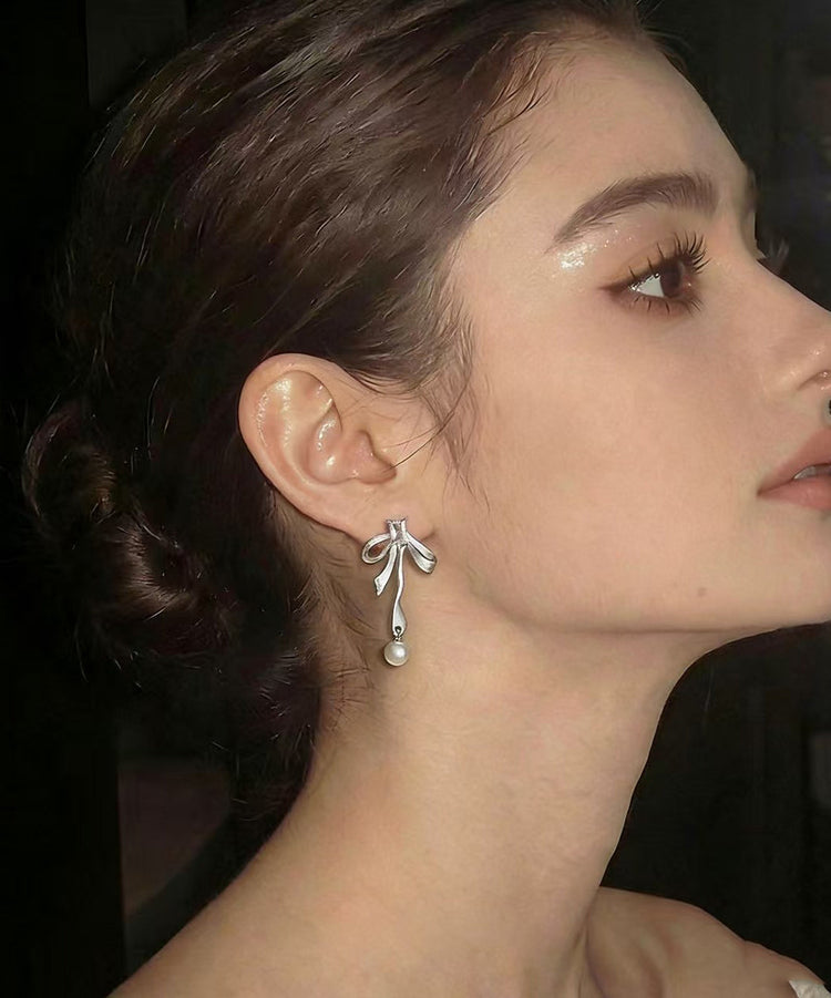 Fashion Silvery Bow Metal Pearl Pendant Fine Zircon Drop Earrings - Omychic