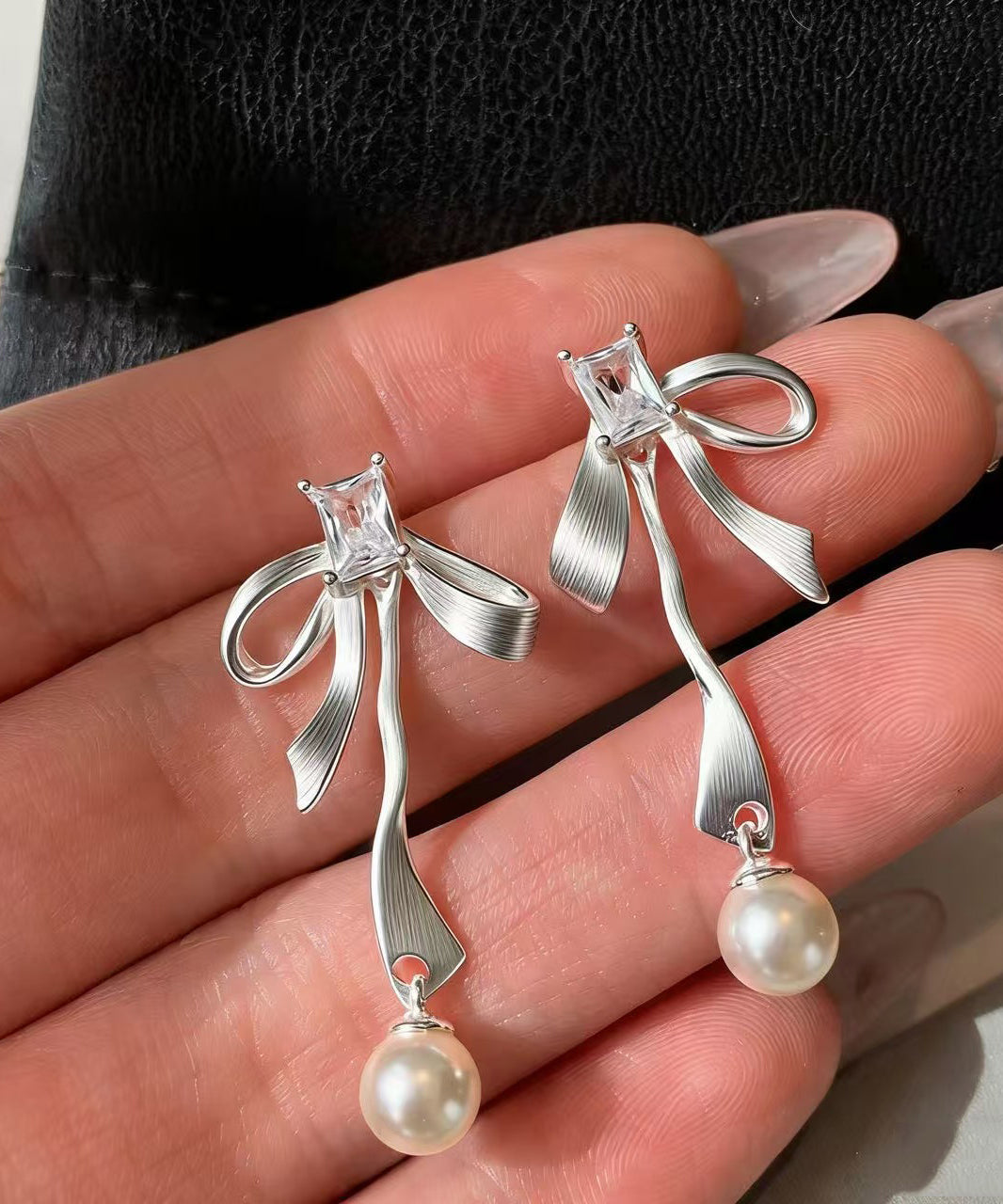 Fashion Silvery Bow Metal Pearl Pendant Fine Zircon Drop Earrings - Omychic