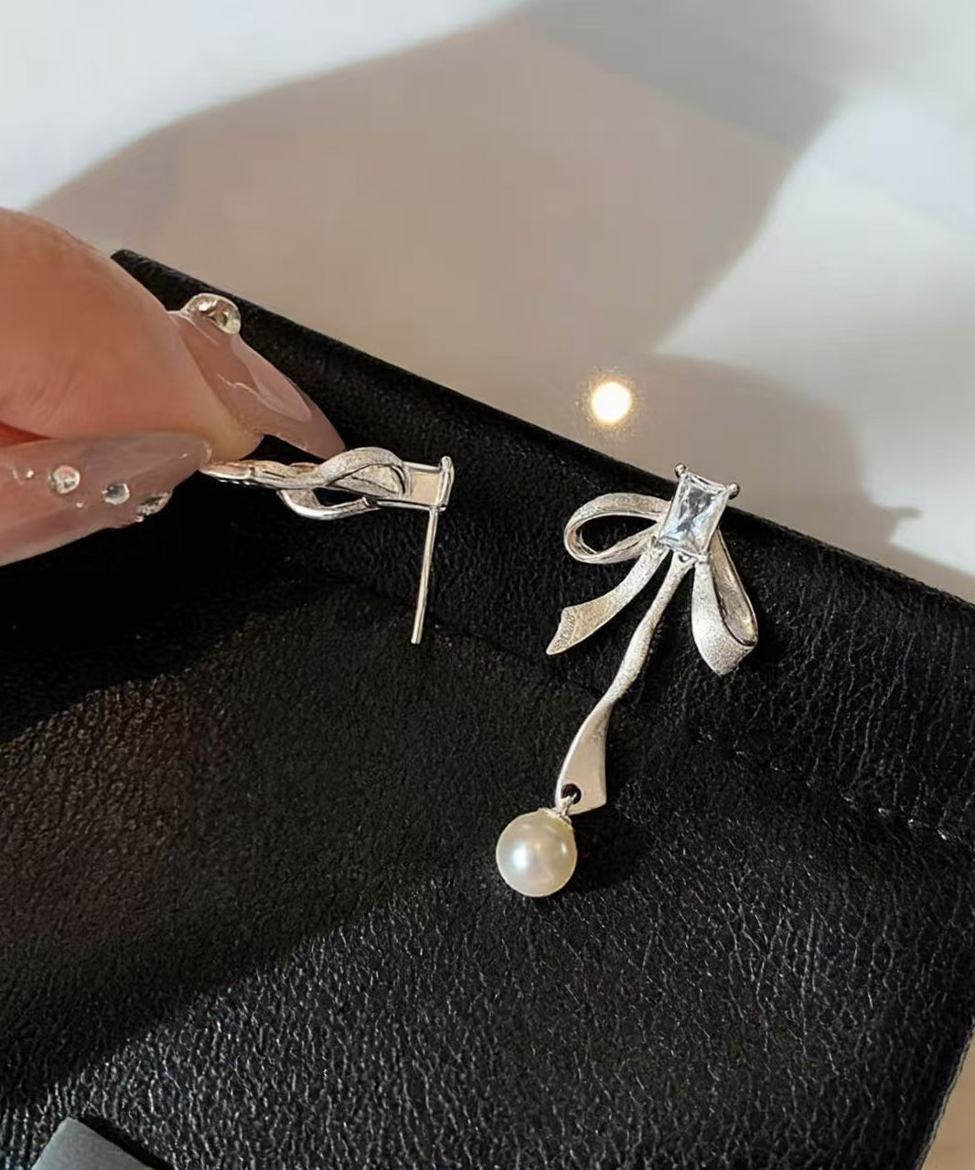 Fashion Silvery Bow Metal Pearl Pendant Fine Zircon Drop Earrings - Omychic