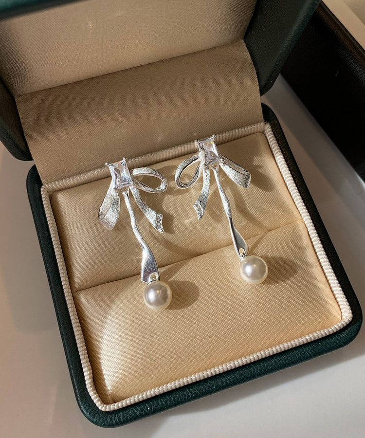 Fashion Silvery Bow Metal Pearl Pendant Fine Zircon Drop Earrings - Omychic