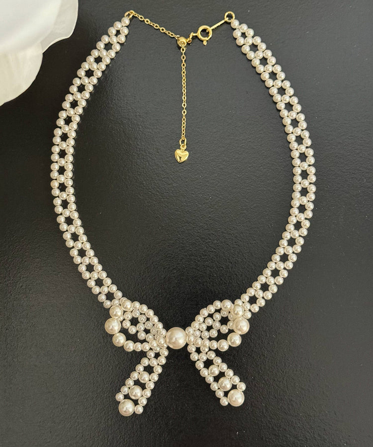 French Pearl Bow Sweater Necklace And Bracelet Set - Omychic