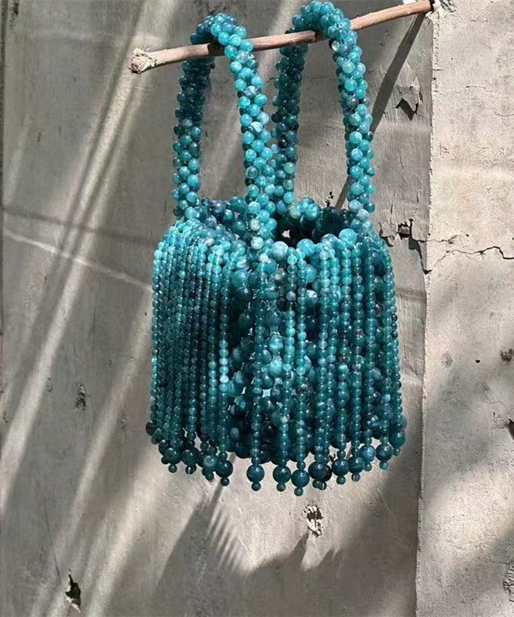 Modern Peacock Blue Beaded Weave Tassel Clutch