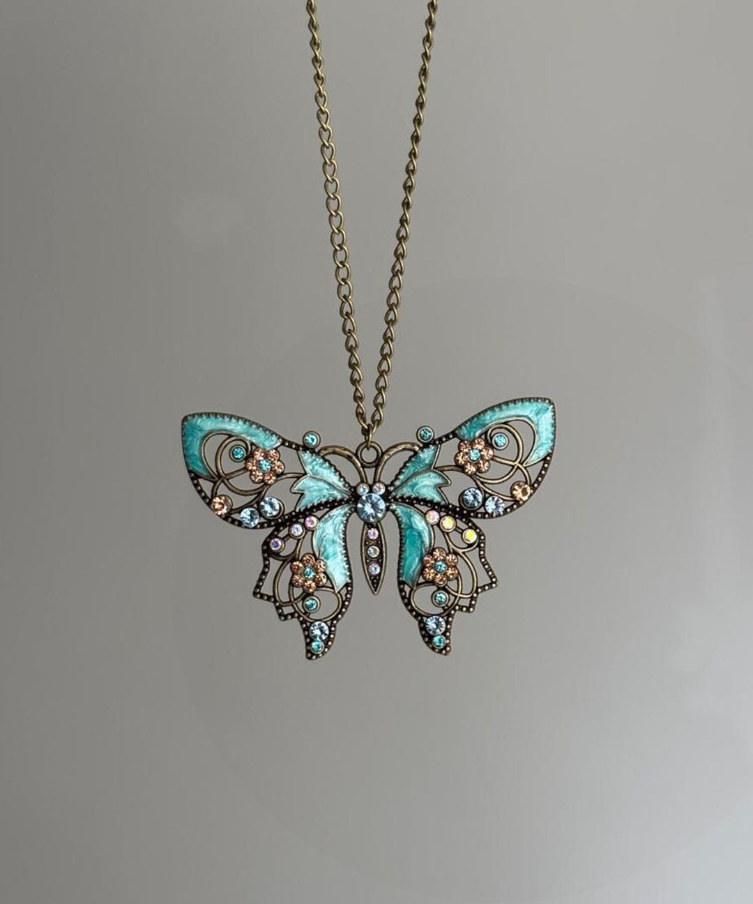 Retro Blue Alloy Zircon Butterfly Hollow Out Pendant Necklace