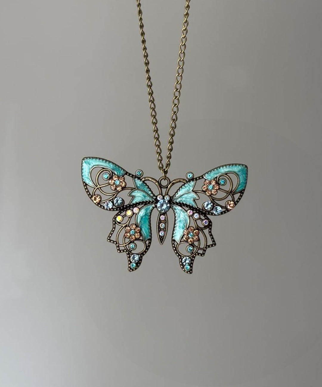 Retro Blue Alloy Zircon Butterfly Hollow Out Pendant Necklace