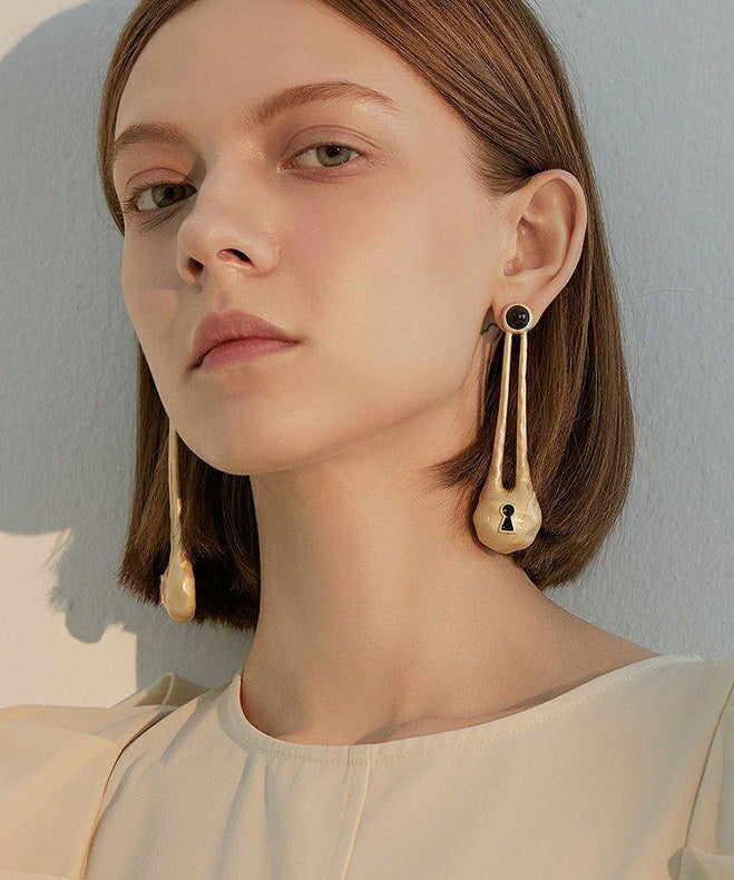 Retro Gold Hollow Out Copper Loose Drop Earrings