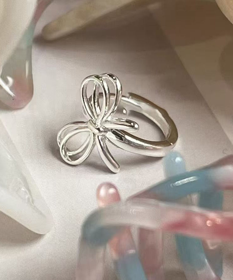 Simple Silk Sterling Silver Bow Hollow Out Hoop Earrings