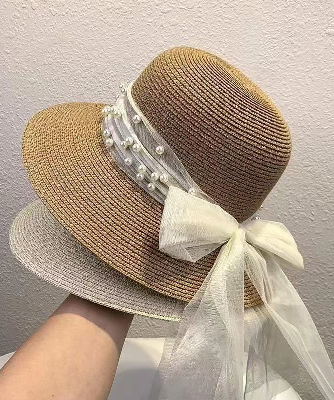 Stylish Khaki Bow Nail Bead Straw Woven Floppy Sun Hat