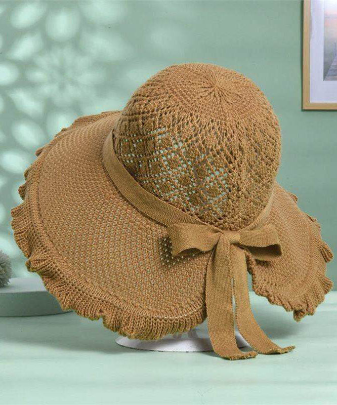 Stylish Khaki Hollow Out Bow Straw Woven Bucket Hat