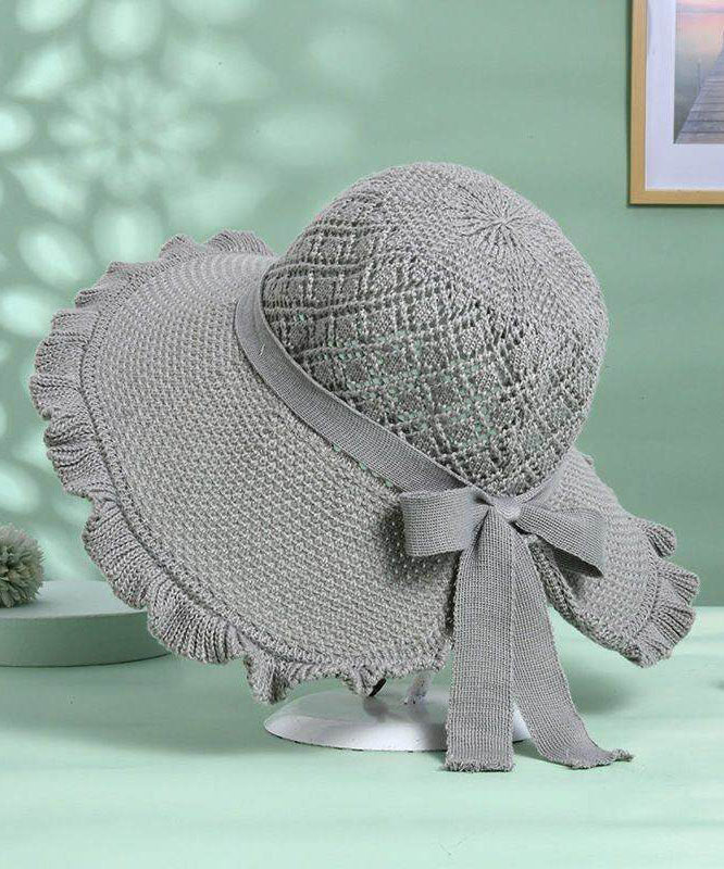 Stylish Khaki Hollow Out Bow Straw Woven Bucket Hat
