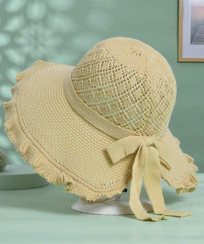 Stylish Khaki Hollow Out Bow Straw Woven Bucket Hat