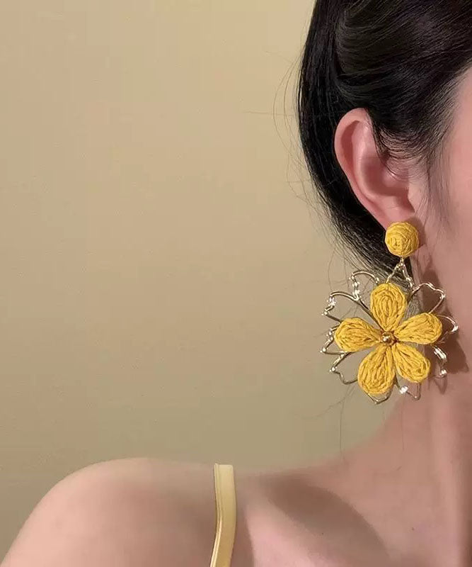 Stylish Yellow Alloy Weavin Hollow Out Floral Drop Earrings