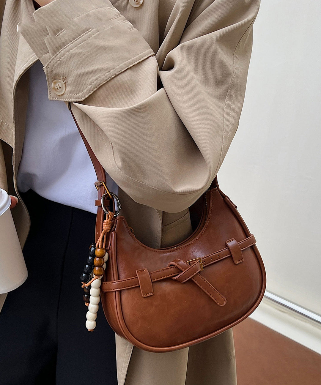 Unique Brown Tasseled Solid Durable Faux Leather Saddle Bag