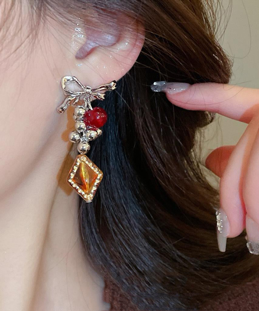 Vintage Acrylic Alloy Asymmetrical Amber Bow Tassel Drop Earrings