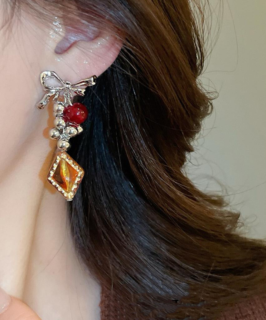 Vintage Acrylic Alloy Asymmetrical Amber Bow Tassel Drop Earrings