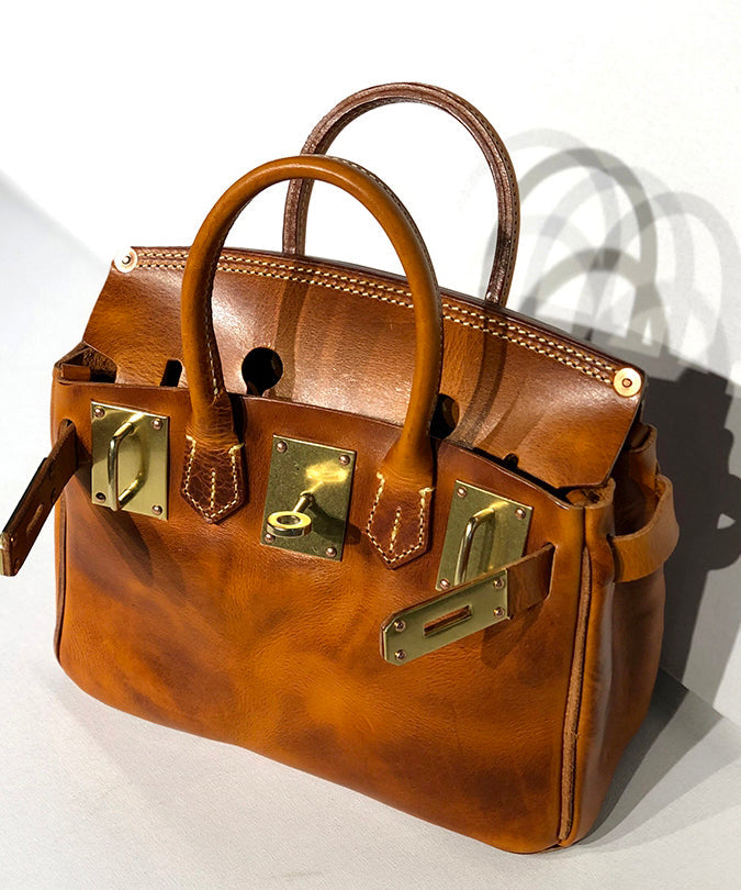Women Brown Solid Durable Patchwork Golden Leather Tote Handbag