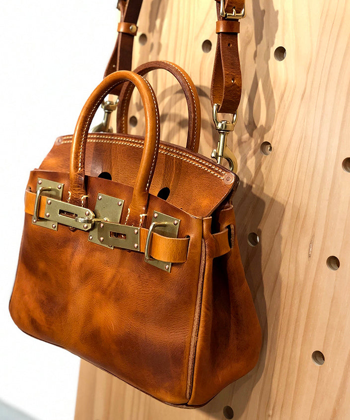 Women Brown Solid Durable Patchwork Golden Leather Tote Handbag