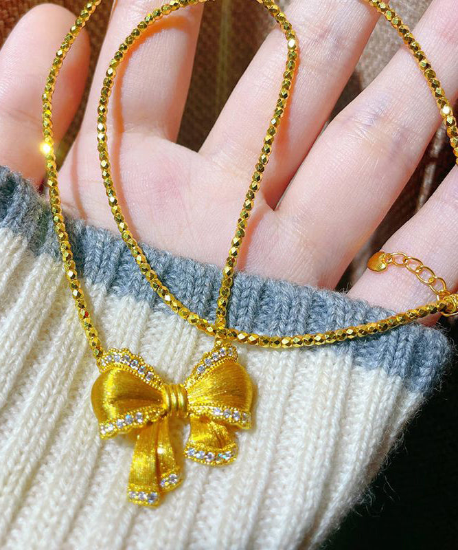 Elegant Gold Bow Zircon Pendant Necklace