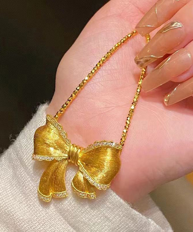 Elegant Gold Bow Zircon Pendant Necklace