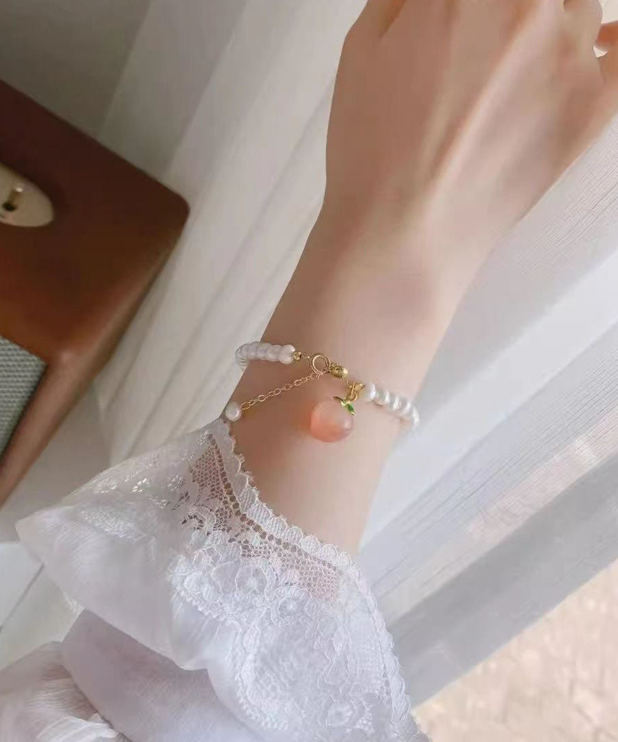 Fine White Alloy Honey Peach Pearl Charm Bracelet